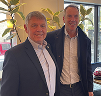 Decker and Harring standing together